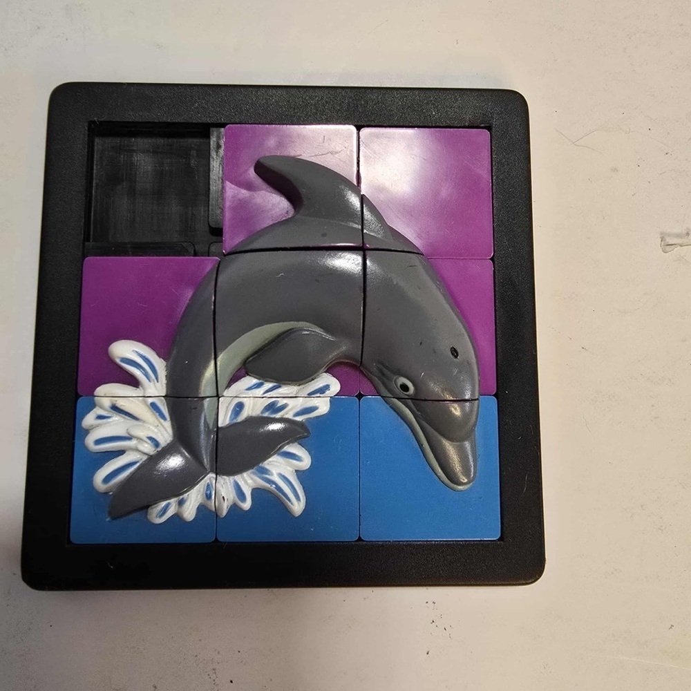 vintage 3D sliding puzzle by Damert dolphin 1990s